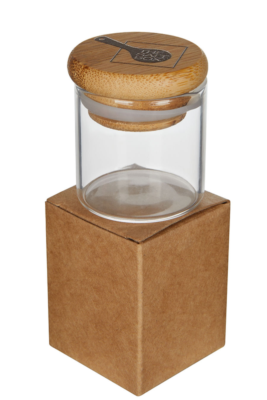 Glass jar packed in cardboard box